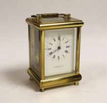 A 20th century brass carriage clock, signed Taylor and Bligh, England, striking on a bell 14cm high