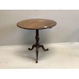 A George III style circular mahogany tilt top tripod tea table, diameter 76cm, height 72cm