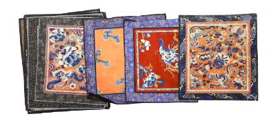 Nine Chinese silk embroidered panels, framed with silk damask borders, circa 20th century, largest