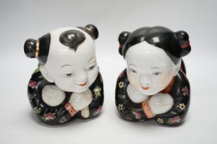 A pair of early 20th century Chinese figural pillows, approx 24cm wide