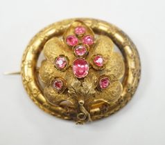 A Victorian yellow metal and foil backed pink stone cluster set oval foliate brooch, 39mm, gross