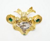 A Victorian engraved yellow metal and foil backed rock crystal and green stone set brooch, width