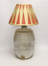 A Victorian glass spirit barrel, mounted as a lamp, 33cm to top of glass