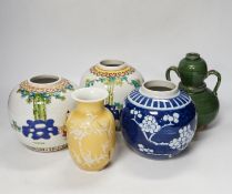 A Chinese blue and white ginger jar, a green two-handled double gourd vase, a pair of vases, and