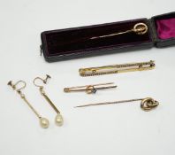 An Edwardian 15ct and seed pearl set bar brooch, 64mm, gross 4.9 grams, a 9ct bar brooch, two