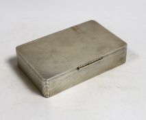 A George VI engine turned silver mounted rectangular cigarette box, Padgett & Braham Ltd, London,