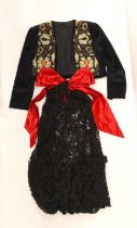 A velvet bolero with ornate polychrome silk embroidered and beaded panels, together with a full