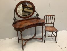 A Theodore Alexander bird's eye maple Empire style kidney shaped dressing table, width 100cm,