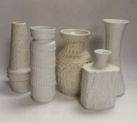 Five West German pottery and biscuit porcelain vases, tallest 24cm