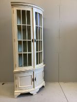 A reproduction George III style painted bow front standing corner cabinet, width 96cm, depth 58cm,