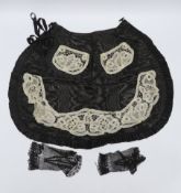 Two 19th century silk baby gowns, a ladies lace trimmed bonnet, a black satin and lace maids