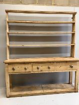 A Victorian pine kitchen potboard dresser with open rack, width 190cm, depth 49cm, height 214cm