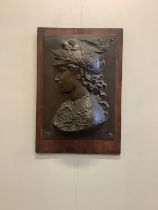 A bronzed spelter relief plaque, width 40cm, height 60cm