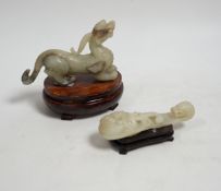 A Chinese pale celadon and grey jade mythical beast on stand, and a pale celadon jade belt hook,