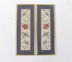 A pair of framed early 20th century Chinese cream silk polychrome silk embroidered sleeve bands,