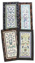 Three pairs of Chinese embroidered sleeve bands, polychrome silk designs on cream silk background,