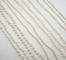 Five assorted single strand cultured pearl necklaces, including four with 9ct clasps, largest 47cm