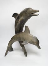 A hollow cast bronze dolphin group, 48cm