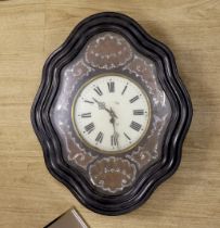 A 19th century French wall clock, with mother of pearl decorative face, 62cm high x 50cm wide