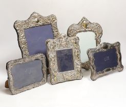 Five assorted modern silver mounted photograph frames, largest 27.5cm.