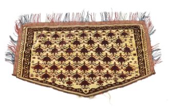 An antique Afghan arched panel woven with rows of stepped decoration on an ivory ground, width