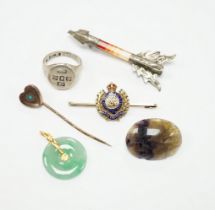 Sundry jewellery including a 1970's silver signet ring, a Chinese yellow metal mounted jade disc