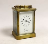 A late 19th century French carriage clock, with alarm, portable in case, clock 14cm high