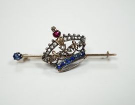 An Edwardian yellow metal, ruby, sapphire and rose cut diamond set coronet bar brooch, 50mm, gross