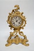 A 19th century French rococo-style ormolu mantel clock with Raingo movement striking on a bell (