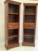 A pair of reproduction hardwood narrow open display cabinets, width 84cm, depth 36cm, height 200cm