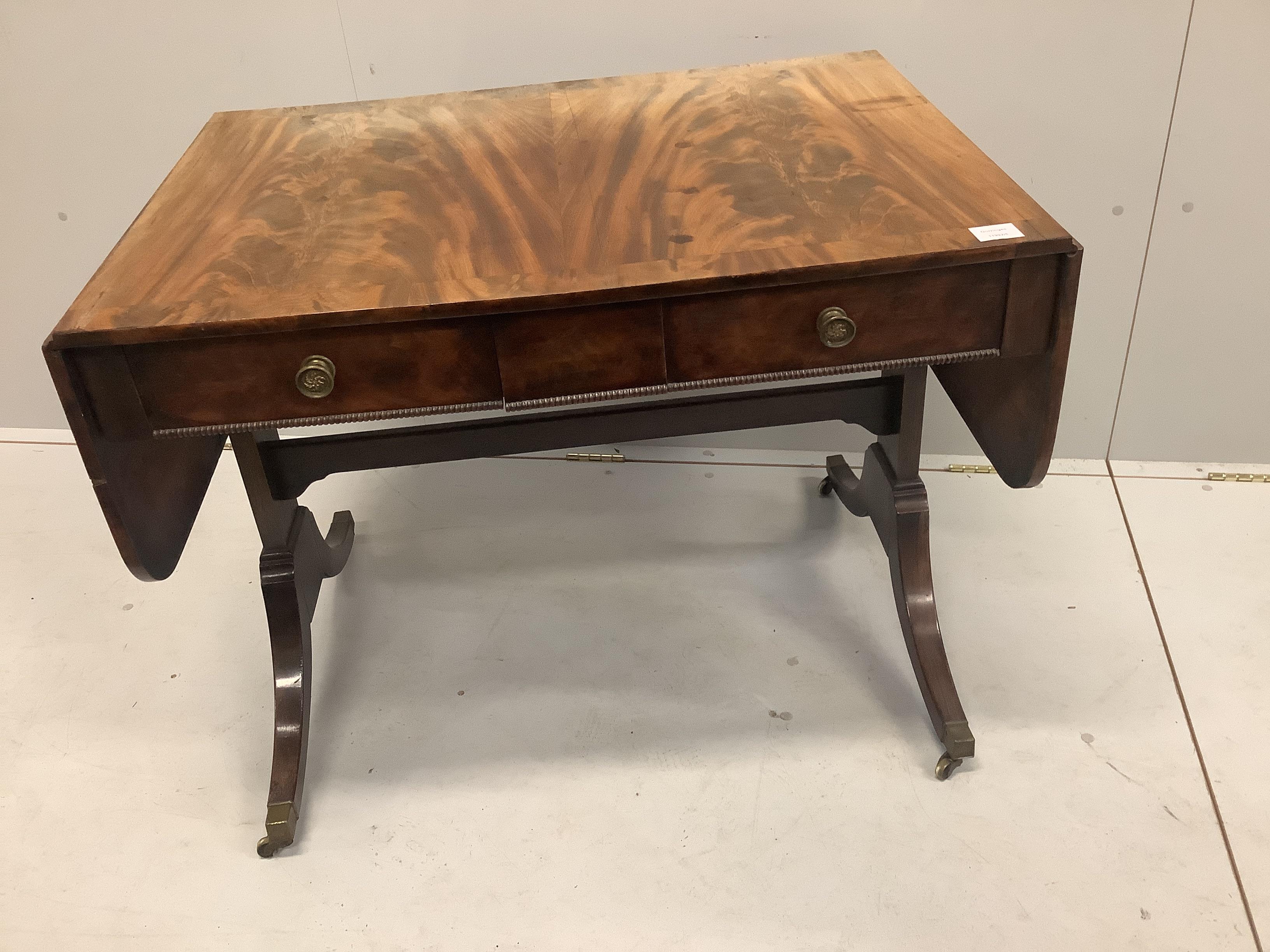 A Regency banded mahogany sofa table, width 92cm, depth 66cm, height 71cm