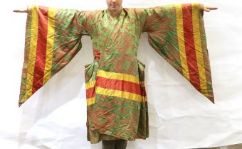 An unusual early 20th century Japanese silk damask kimono, designed with pointed sleeves and wide