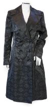 A Escada lady's monogram black trench coat, size 38