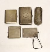 Two George V engine turned silver compacts, largest 83mm, a silver mounted aide memoire wallet, a