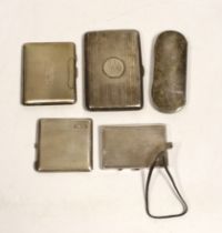 Two George V engine turned silver compacts, largest 83mm, a silver mounted aide memoire wallet, a