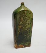 A 19th century green glazed terracotta sgraffito flask, 19cm