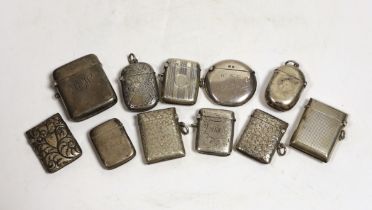 Nine assorted mainly early 20th century silver vesta cases and one similar white metal vesta case,