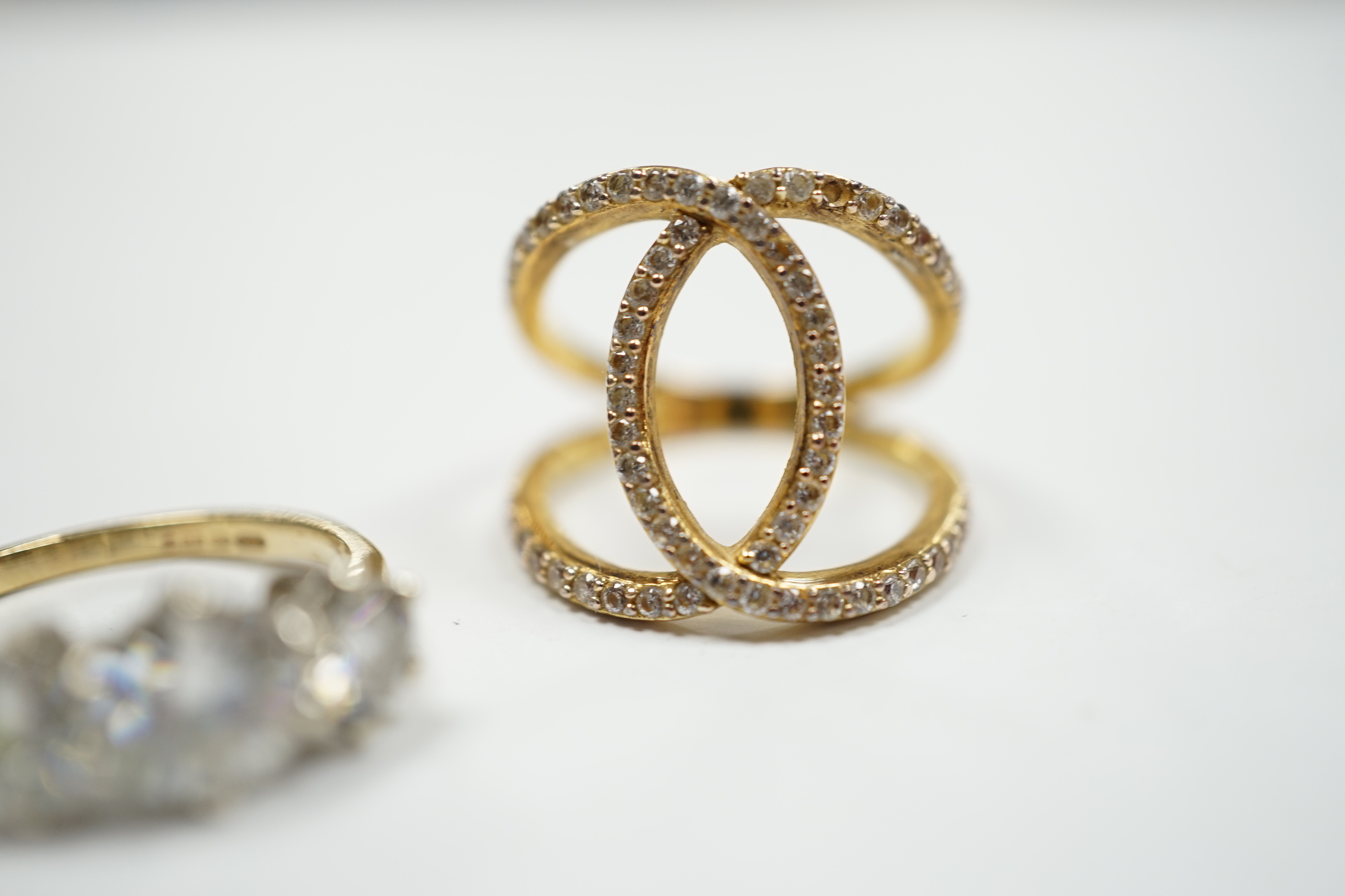A 9ct gold and three stone simulated diamond ring and a gilt 925 ring. - Image 5 of 7