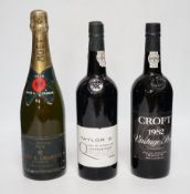 A bottle of Moët & Chandon 1978 Dry Imperial Champagne, a bottle of Croft 1982 Vintage Port and a