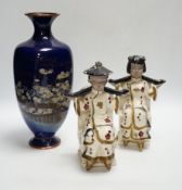 A pair of Japanese earthenware bookends and a Japanese cloisonné enamel vase, decorated in the musen