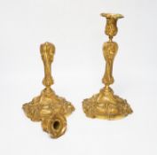 A pair of French ormolu candlesticks, one detached sconce, 30cm