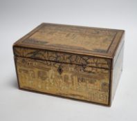 A 19th century Chinese export lacquer tea caddy, black ground with gilt decoration, containing a