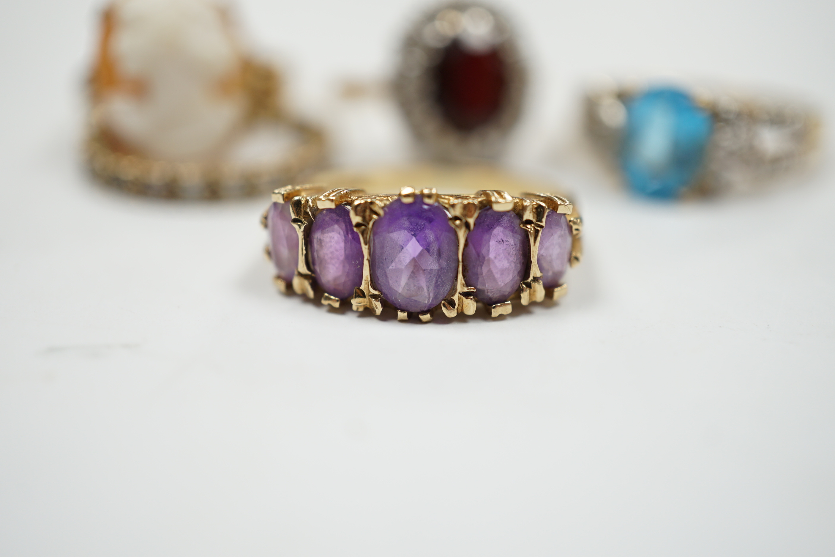 Five assorted modern 9ct and gem set dress rings, including graduated five stone amethyst and - Image 2 of 6