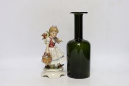 A 1960's Swedish green glass bottle vase and a Goebel figure group, Garden Princess, largest 25cm