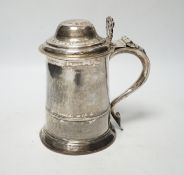 A George III silver tankard, with banded girdle, makers mark on lid and base differ?, London,