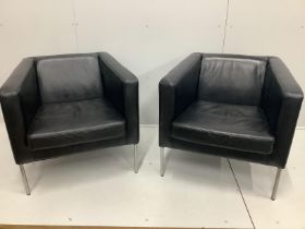 A pair of contemporary black leather armchairs, width 77cm, depth 69cm, height 72cm