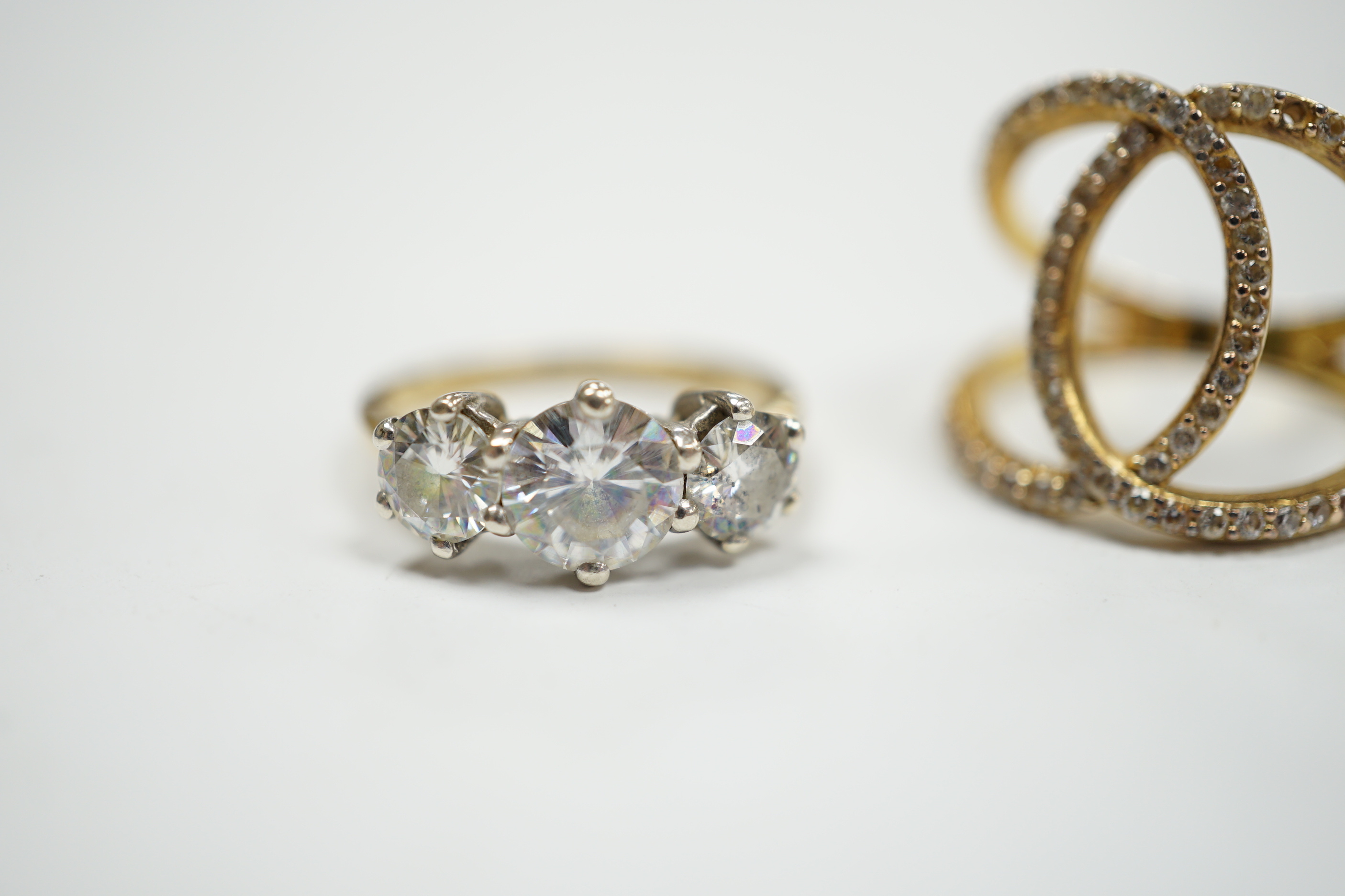 A 9ct gold and three stone simulated diamond ring and a gilt 925 ring. - Image 4 of 7