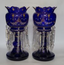 A pair of Victorian enamelled blue glass table lustres, 37cm high