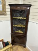 * * A George III style mahogany standing corner cupboard, width 78cm, depth 48cm, height 187cm