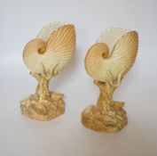 A pair of Royal Worcester blush ivory nautilus shell spill vases, 17cm